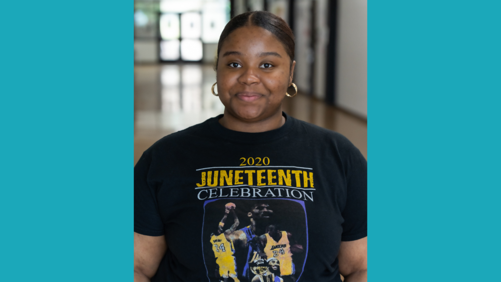 African American high school girl wearing a black Juneteenth t-shirt