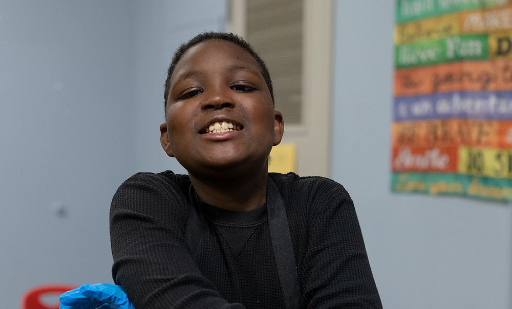 African American male child smiling big at the camera