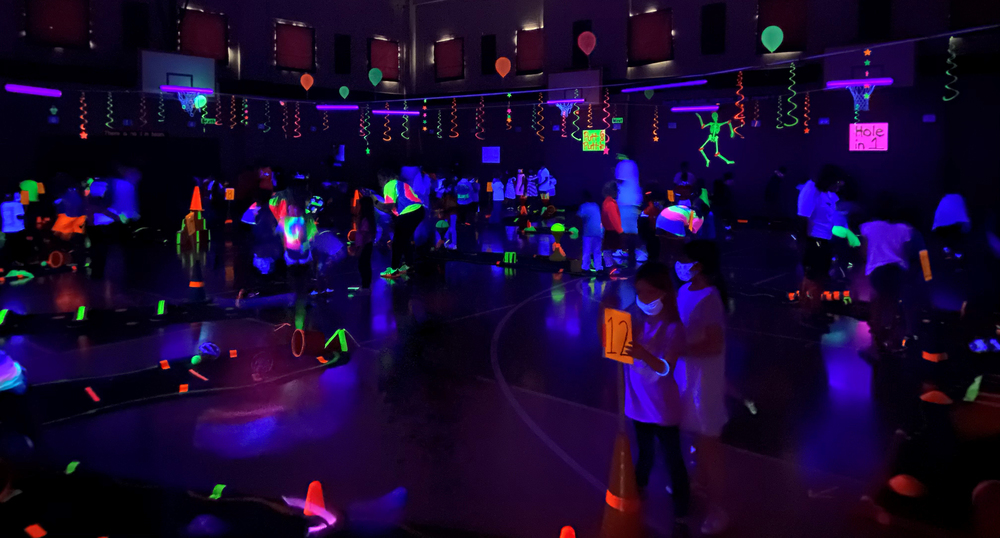 Andy Woods Elementary School Transforms Gym into Neon Putt-Putt Course