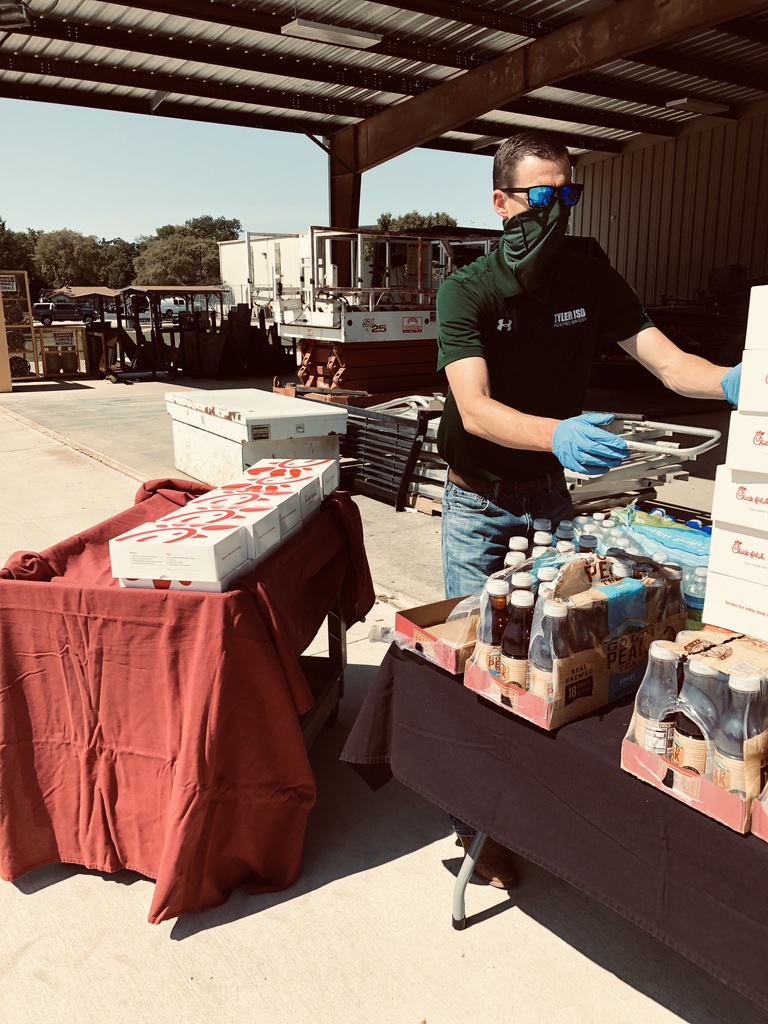 Brady passing out free lunches to team