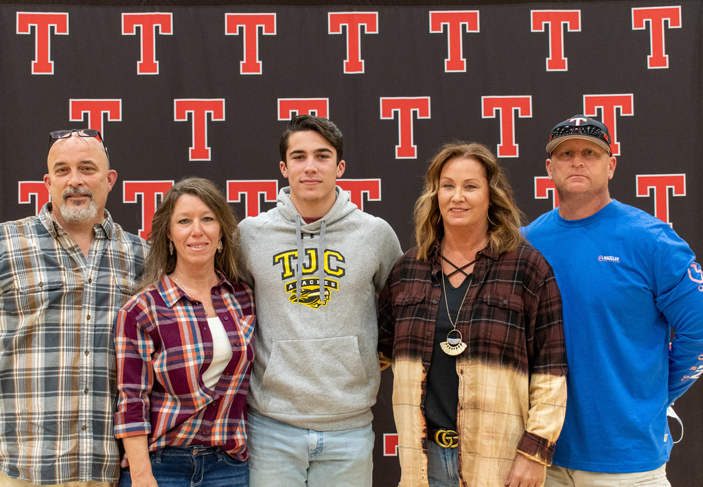 Tyler Legacy Senior, Colby Harris, posing with his family after signing.
