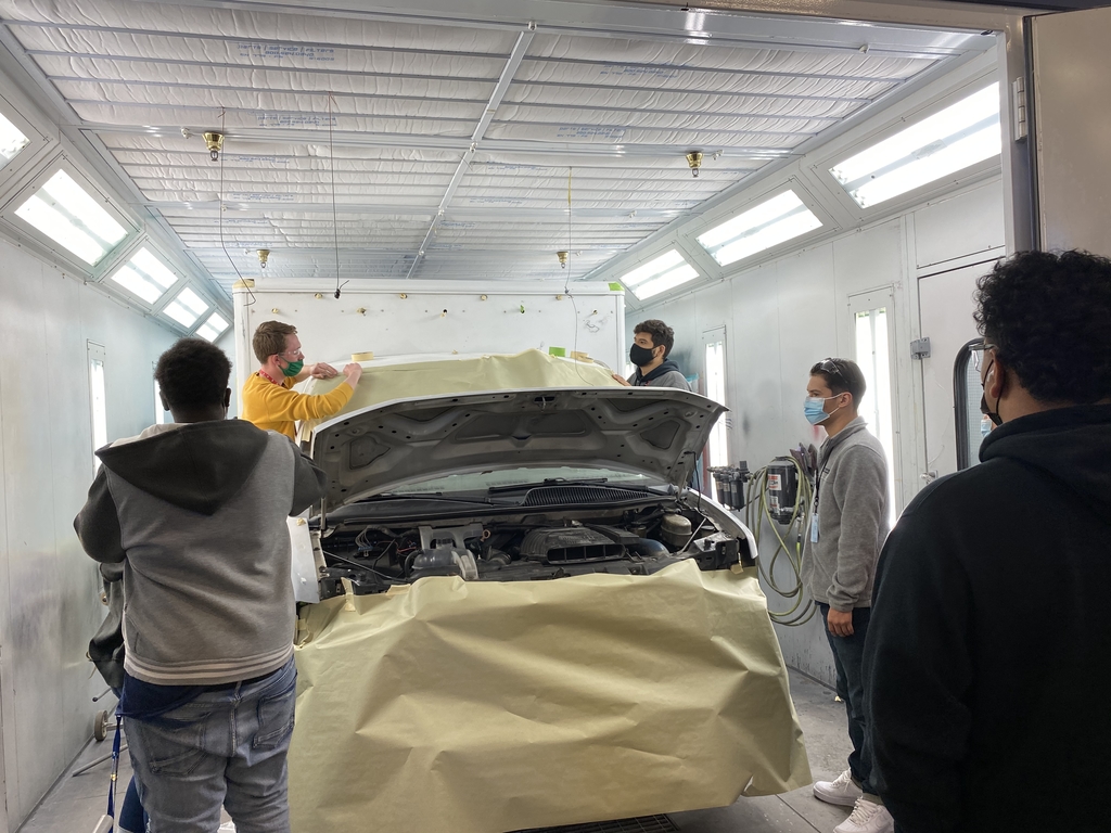 Students preparing to paint the CTC/EMT ambulance