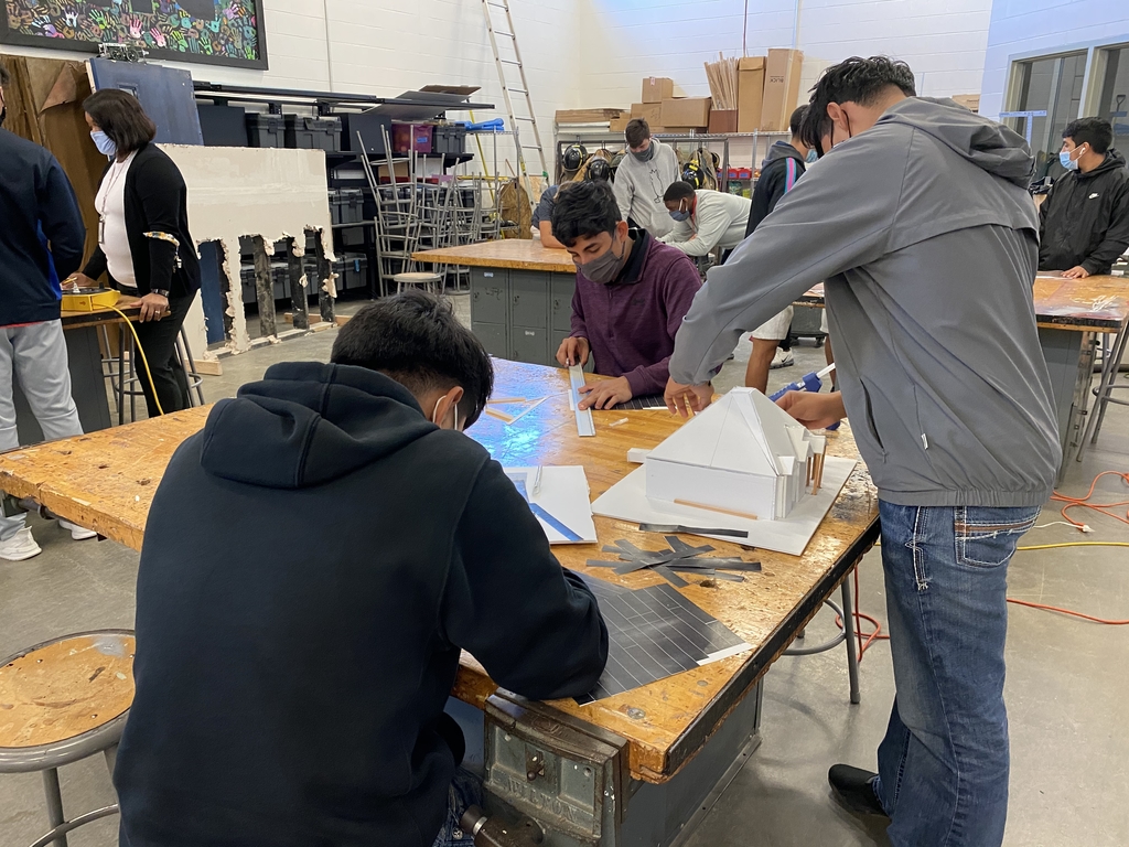 Students building model homes