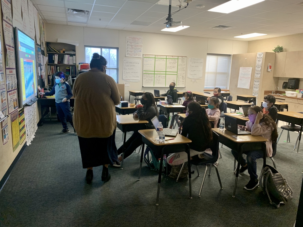 Griffin Bulldog 3rd graders hard at work in Mr. Rodriguez’s class with Ms. Adame.