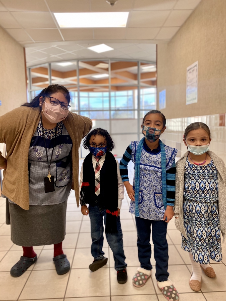 Ms. Adame and students dress as centenarians for the 100th Day of School!