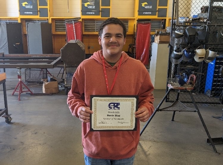 Student receiving award