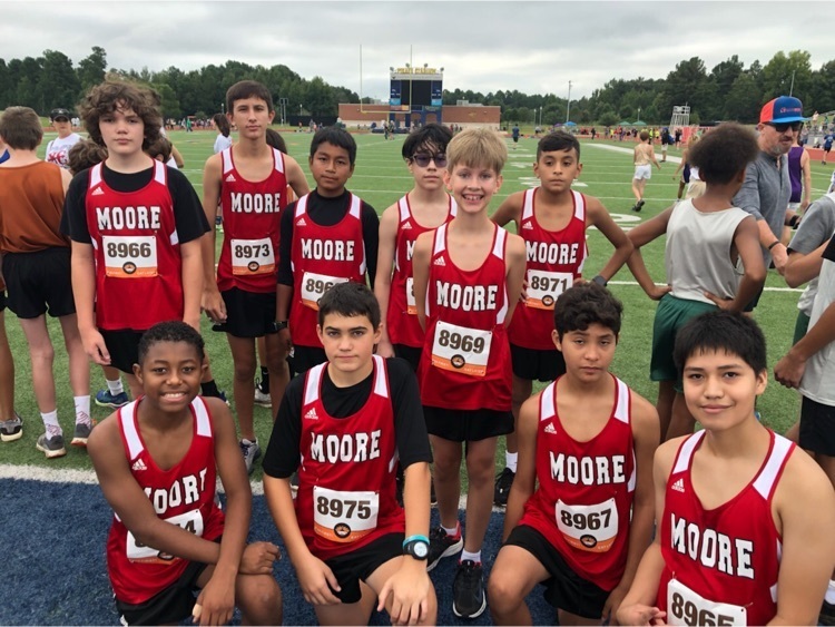 group of moore Mustang cross country runners.