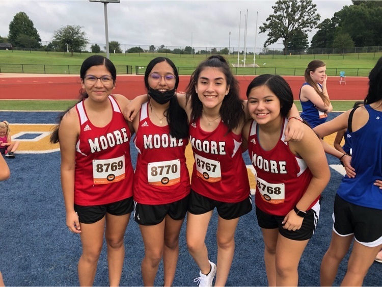 group of girl cross country runners from Moore.