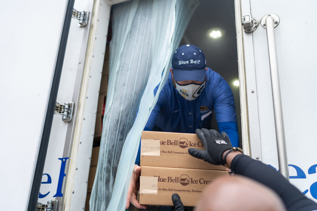 Blue Bell worker unloading ice cream