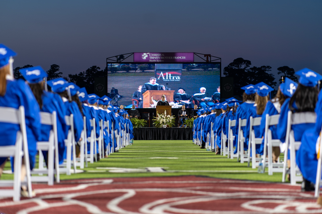 center view of the isle at graduation inside of Rose Stadium