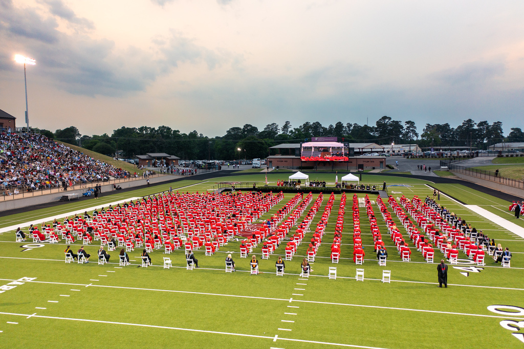 Wide shot of graduates at commencement ceremony