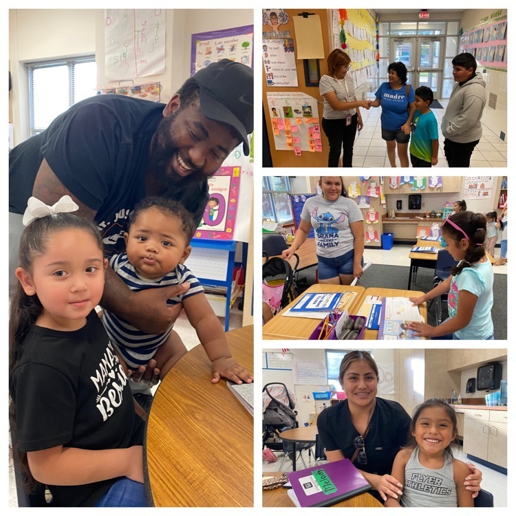 teachers and families posing at open house