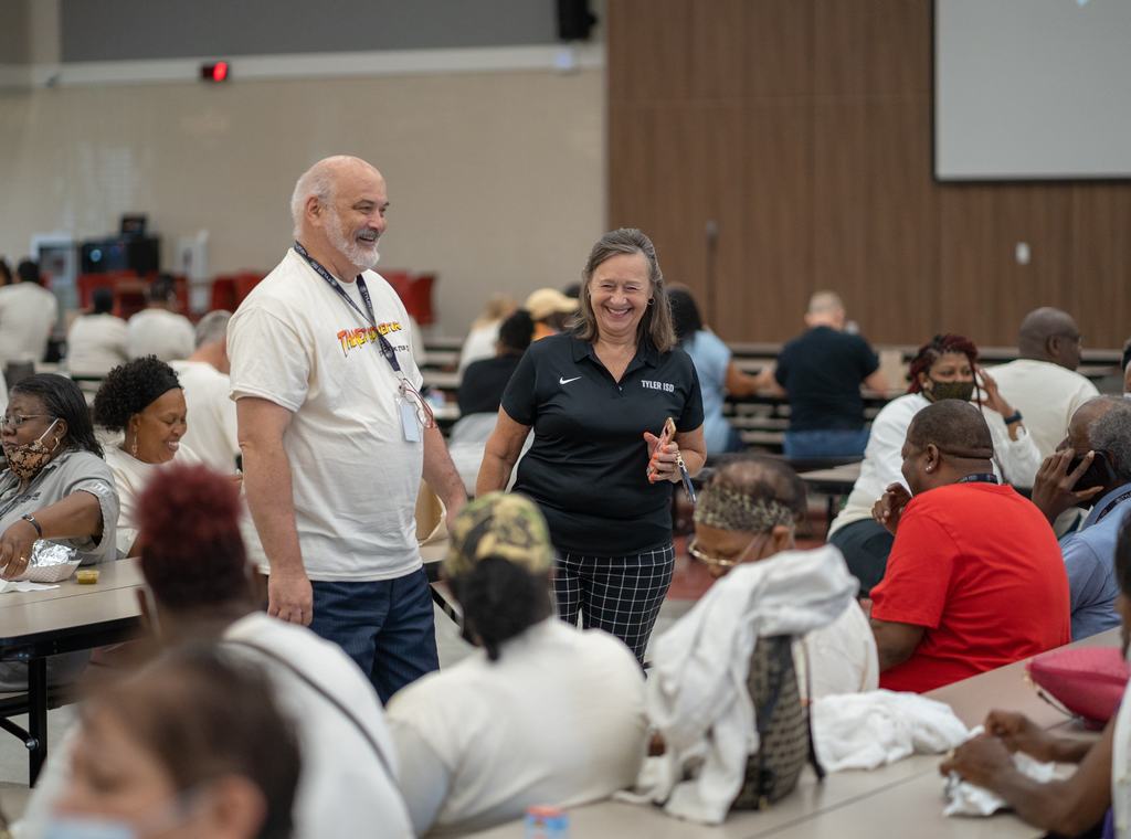 Dr. Nation speaking to employees at convocation