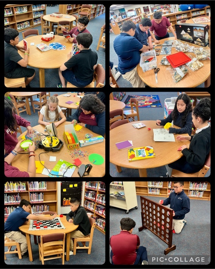 middle school students working in makerspace and steam stations in the library